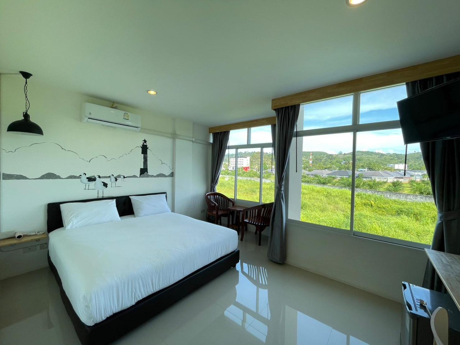 Dwell Phuket Airport Hotel At Naiyang Nai Yang Bagian luar foto